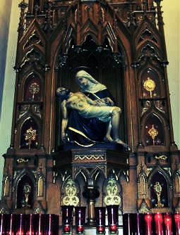 an altar with Jesus and Mary